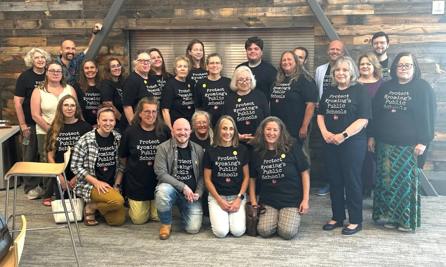 Members in "Protect Public Schools" shirts