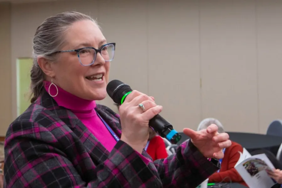 WEA member with a microphone